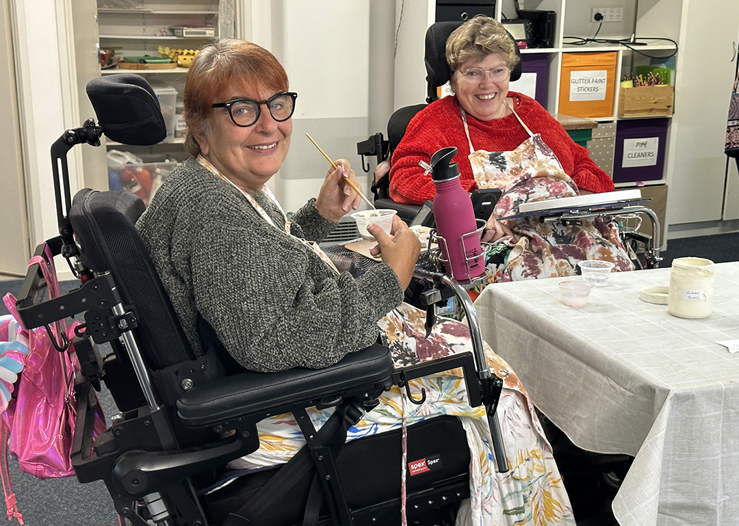 Karen and Beverly are long-term powerchair users who upgraded more than a year ago from Magic Mobility’s previously smallest mid-wheel drive – the Frontier V6 Compact 